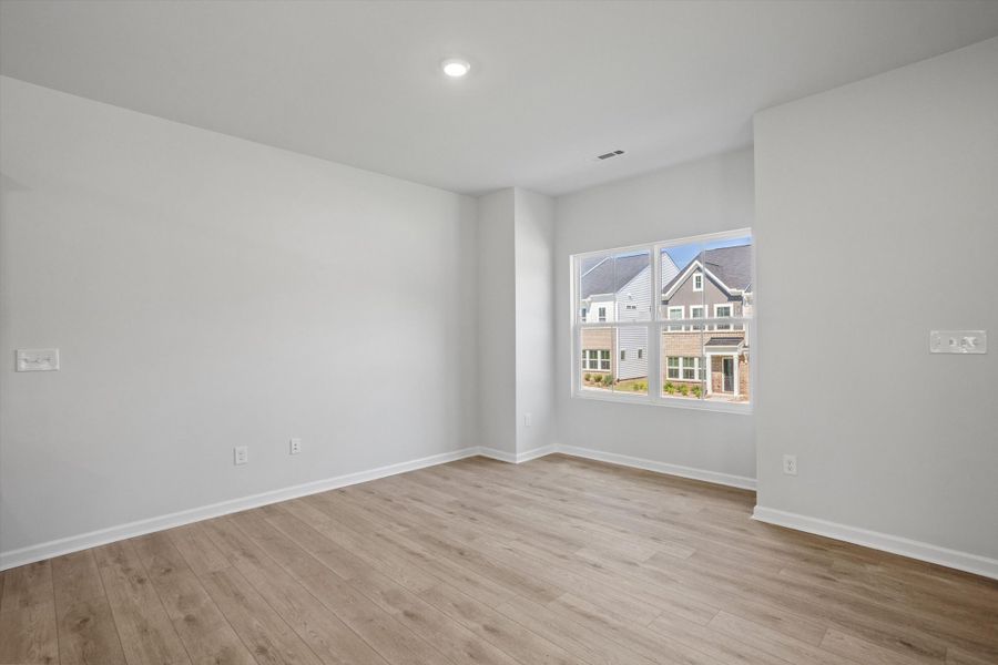 Spacious, unfurnished interior of a new home in Renaissance at White Oak, Garner (Image 11).