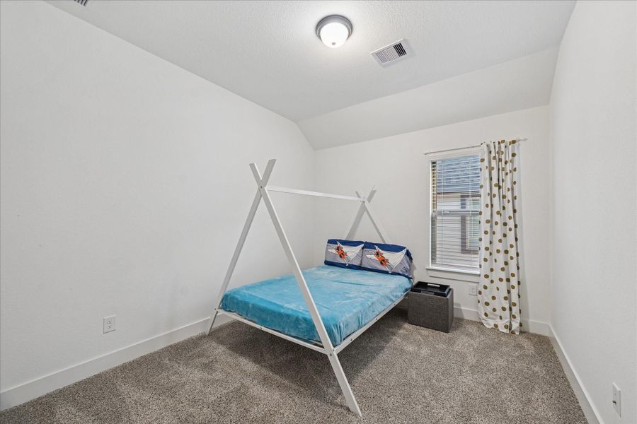Furnished interior view inside a new home in , Conroe (Image 5).