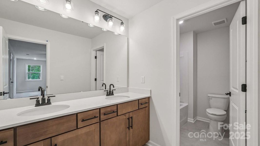 Furnished interior view inside a new home in Falls Cove, Troutman (Image 5).