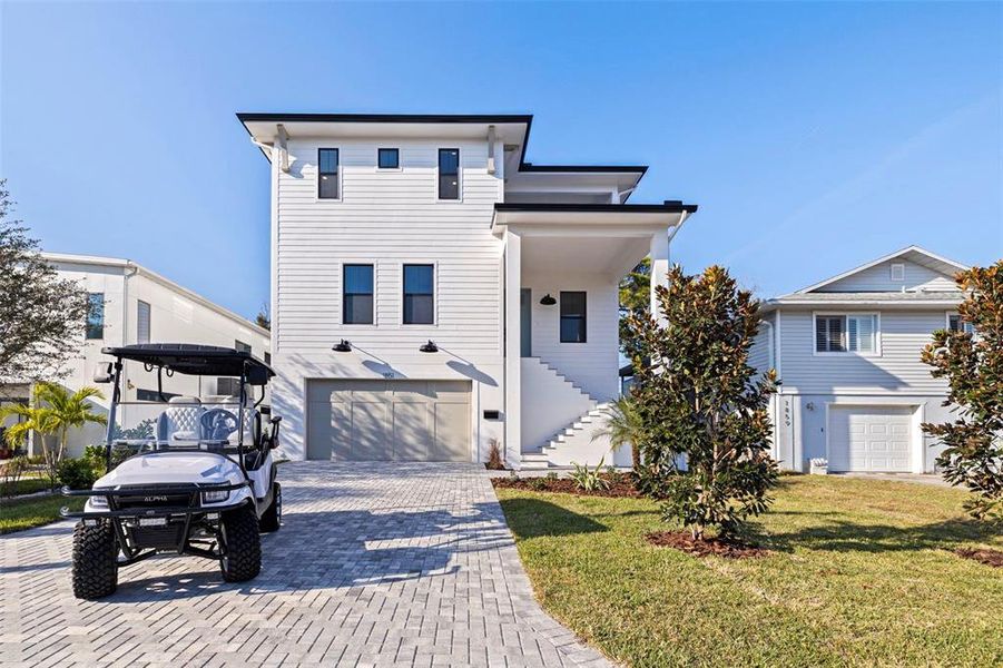 Front exterior of a new home in , St. Petersburg, FL, highlighting curb appeal (Image 27).