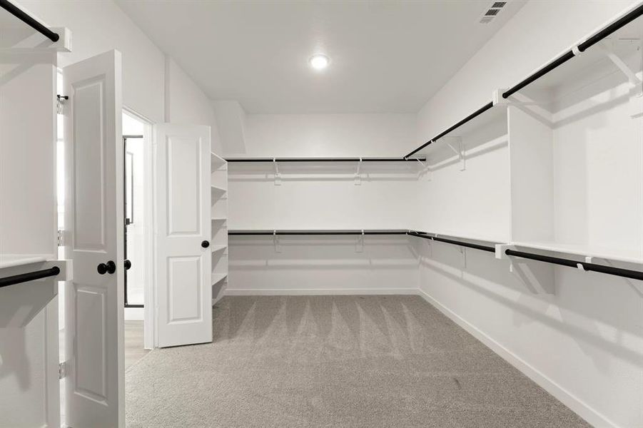 Primary Walk-In Closet Primary Walk-In Closet