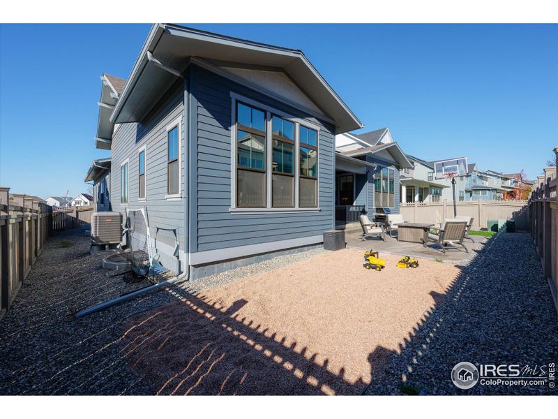Exterior details and patio area of a home in Westerly, Erie (Image 2). Exterior details and patio area of a home in Westerly, Erie (Image 2).