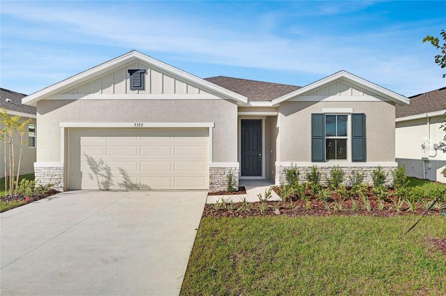 Front exterior of a new home in Annabelle Estates, Lake Wales, FL, highlighting curb appeal (Image 1). Front exterior of a new home in Annabelle Estates, Lake Wales, FL, highlighting curb appeal (Image 1).
