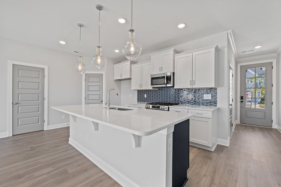 Representative furnished interior of a home built from the The Hemlock by RobuckHomes in Kennebec Crossing, Angier (Image 9).