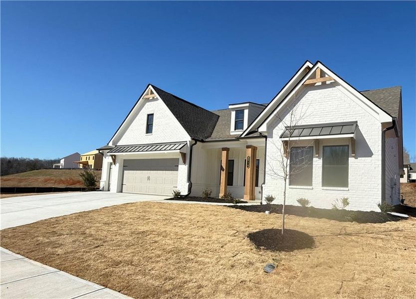 Front exterior of a new home in Ponderosa Farms Reserve, Gainesville, GA, highlighting curb appeal (Image 25).