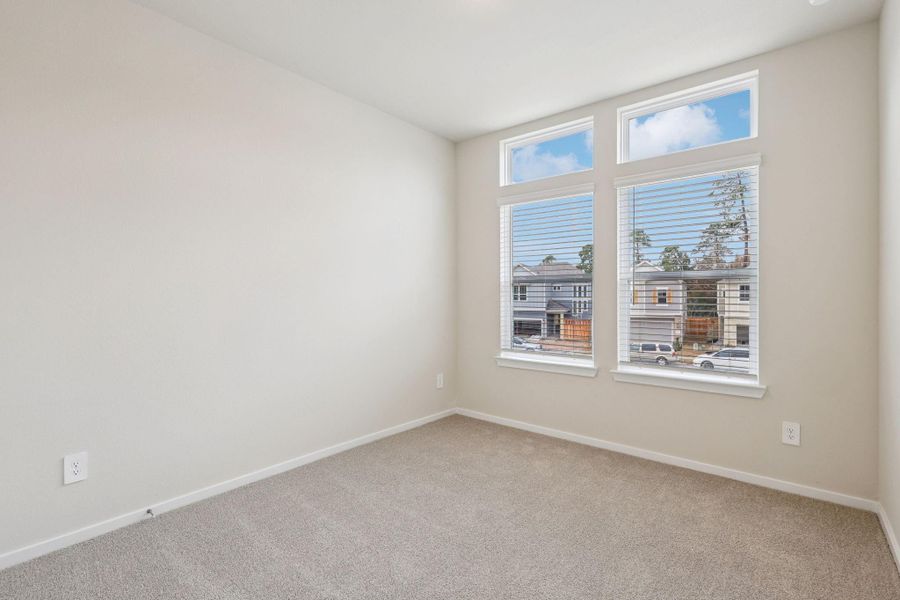 Spacious, unfurnished interior of a new home in Pinewood Trails - City Series, Atascocita (Image 20).