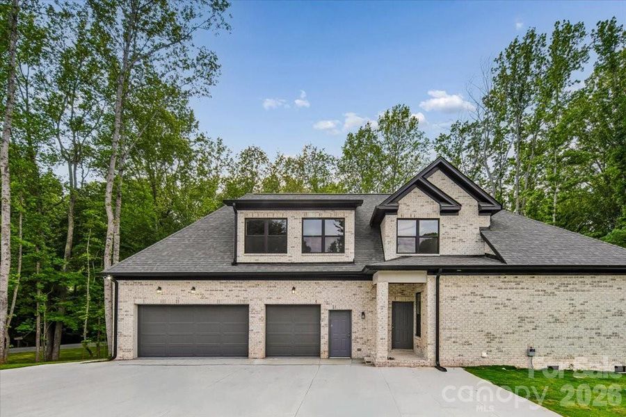 Front exterior of a new home in , Waxhaw, NC, highlighting curb appeal (Image 27).