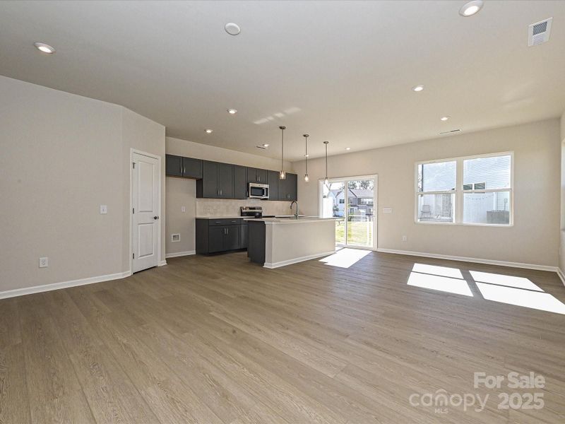 Durable and Easy to Maintain Flooring Spreads Across the First Floor. Durable and Easy to Maintain Flooring Spreads Across the First Floor.