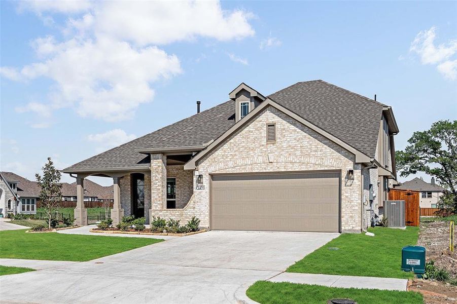 Front exterior of a new home in Liberty, Melissa, TX, highlighting curb appeal (Image 2).