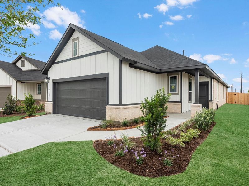 Front exterior of a new home in Mason Woods, Cypress, TX, highlighting curb appeal (Image 16). Front exterior of a new home in Mason Woods, Cypress, TX, highlighting curb appeal (Image 16).
