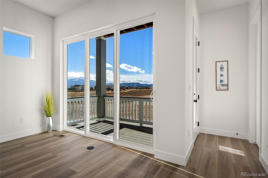 Spacious, unfurnished interior of a new home in Revel Crossing at Wolf Ranch - The Panorama Collection, Colorado Springs (Image 33).