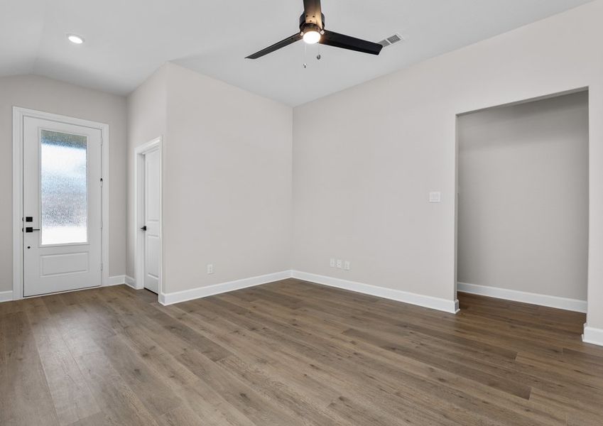 The living room has plenty of space to gather with family and friends. The living room has plenty of space to gather with family and friends.