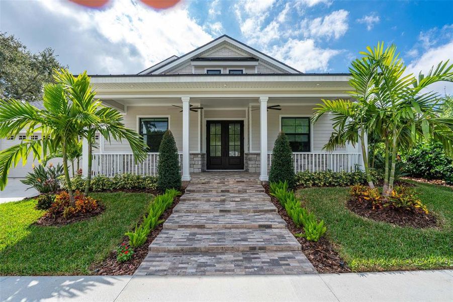 Front exterior of a new home in , Safety Harbor, FL, highlighting curb appeal (Image 24). Front exterior of a new home in , Safety Harbor, FL, highlighting curb appeal (Image 24).