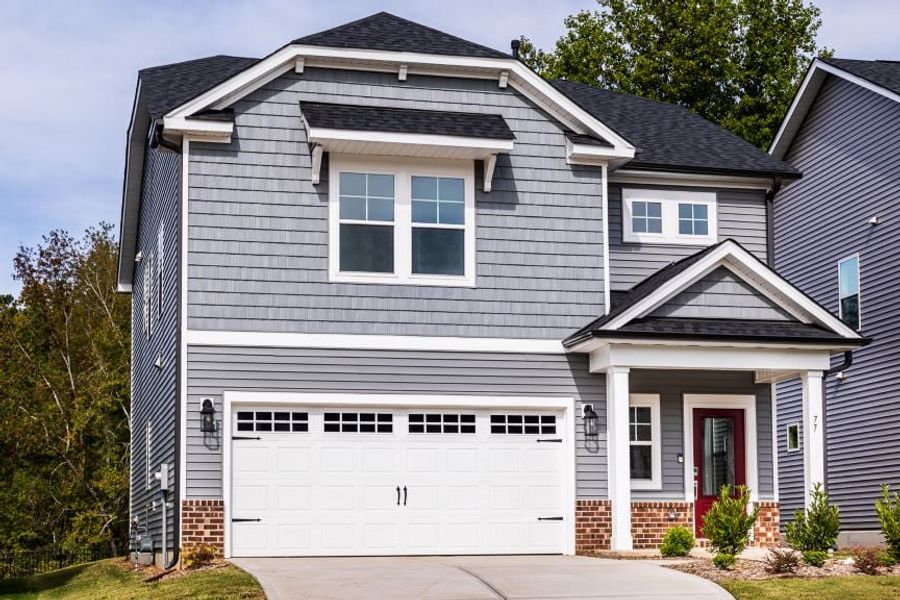 Representative exterior photo of a completed home built from the Stella by Taylor Morrison in Camden, Willow Spring, NC (Image 13). Representative exterior photo of a completed home built from the Stella by Taylor Morrison in Camden, Willow Spring, NC (Image 13).