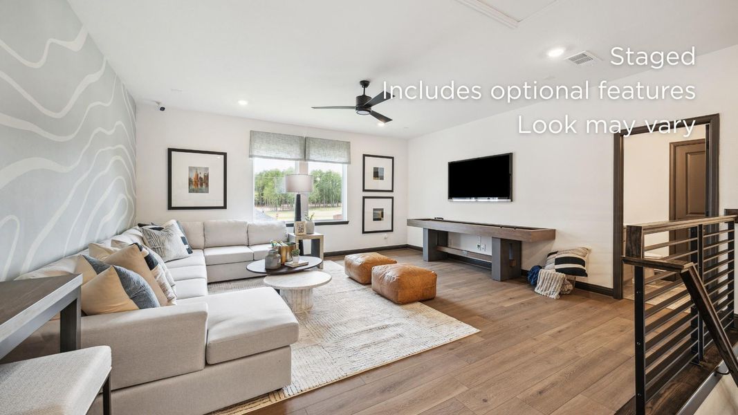 Furnished interior view inside a new home in The Grand Prairie 60', Hockley (Image 13).