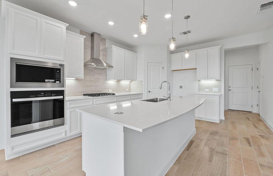 Furnished interior view inside a new home in Wolf Ranch, Georgetown (Image 8).