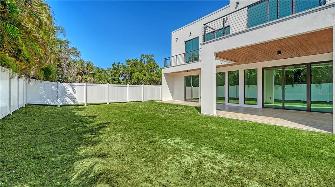 Exterior details and patio area of a home in , Sarasota (Image 32).