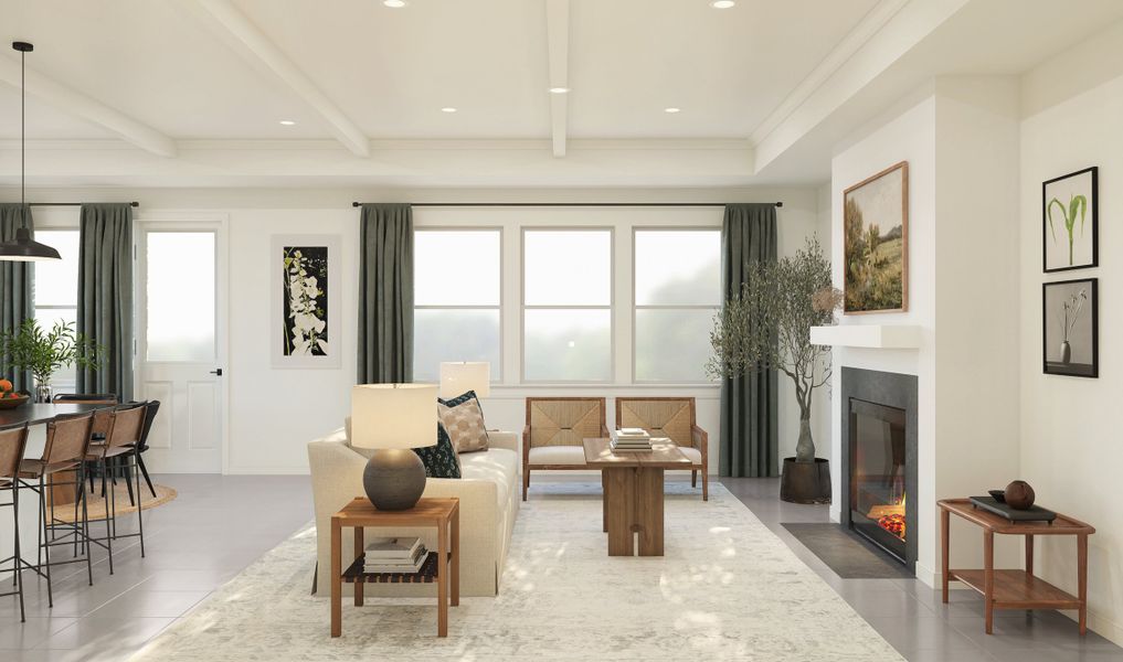 Great room with tray ceiling and ceiling beams