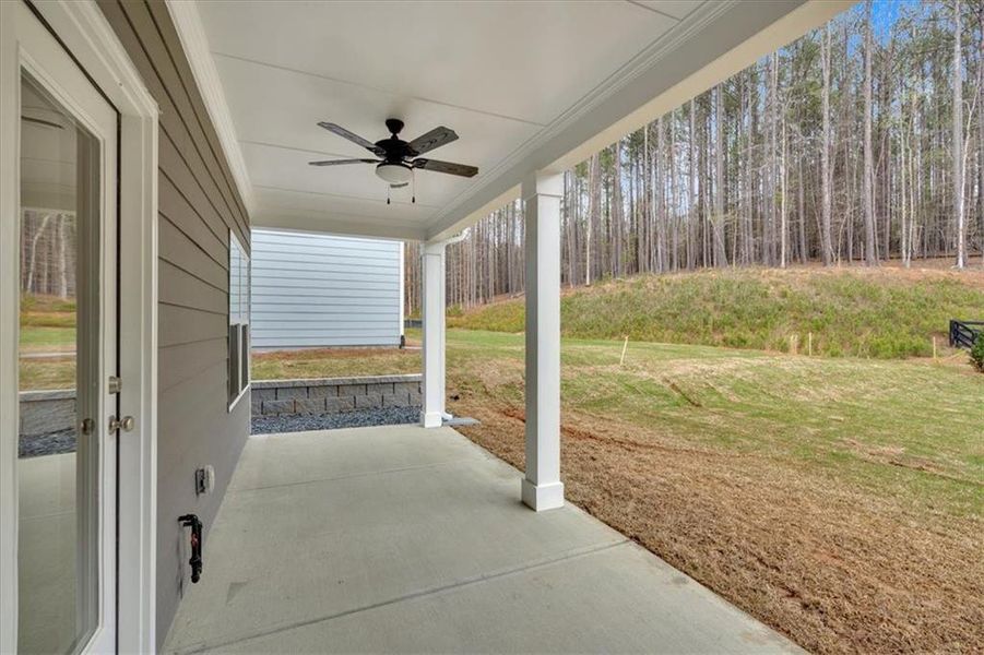 Exterior details and patio area of a home in Stratford at NatureWalk, Dallas (Image 4).