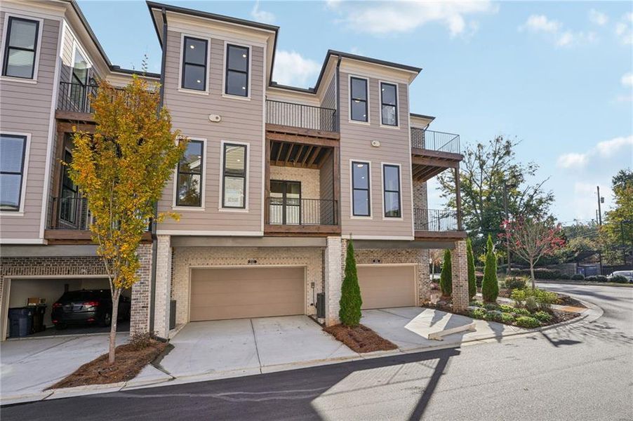 Front exterior of a new home in Towns on Thompson, Alpharetta, GA, highlighting curb appeal (Image 24).