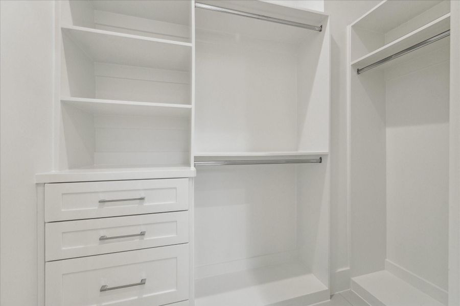 Secondary bedroom closet with built-ins Secondary bedroom closet with built-ins