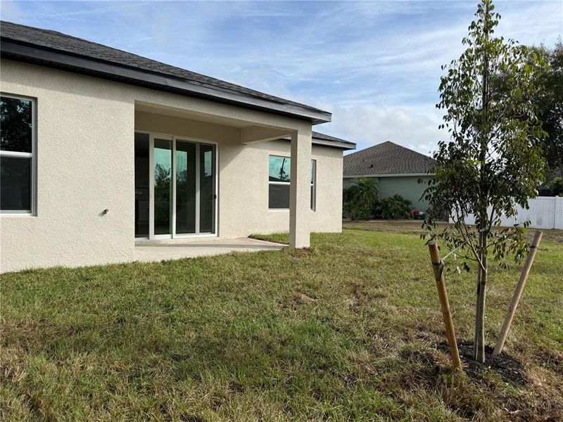 Exterior details and patio area of a home in , North Port (Image 29).