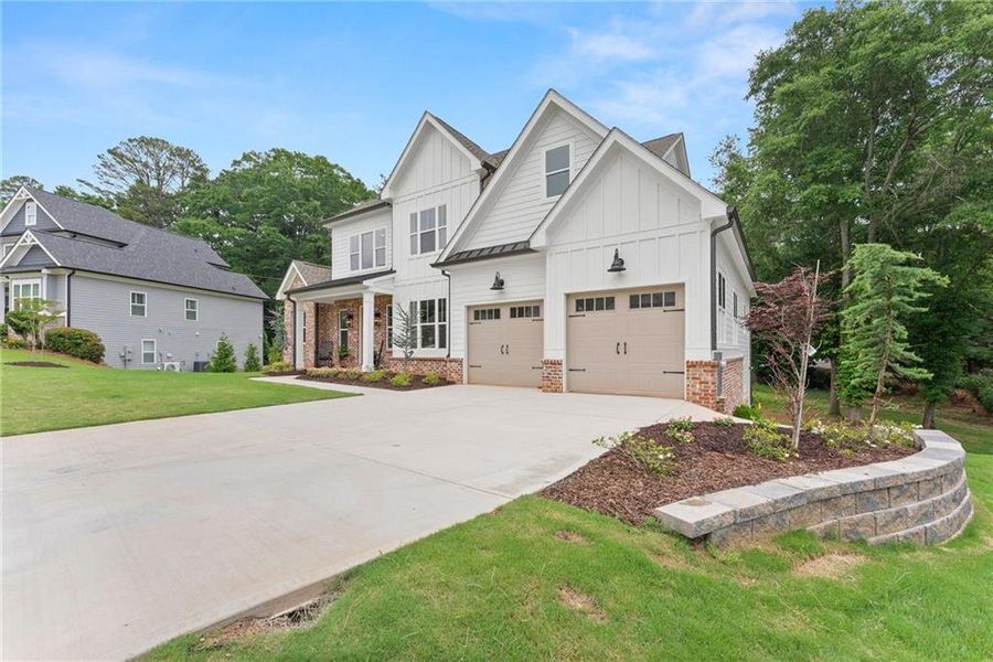 Front exterior of a new home in , Gainesville, GA, highlighting curb appeal (Image 28).