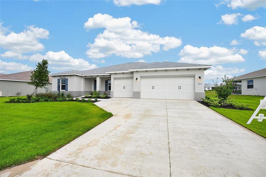 Front exterior of a new home in , Ocala, FL, highlighting curb appeal (Image 28).