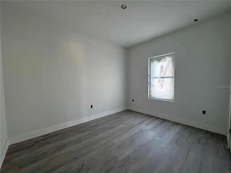 Spacious, unfurnished interior of a new home in , Port Charlotte (Image 7).