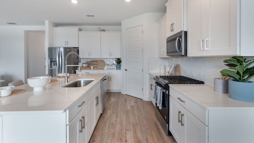 Representative furnished interior of a home built from the DENHAM by D.R. Horton in Lakes of Mount Dora, Mount Dora (Image 17).