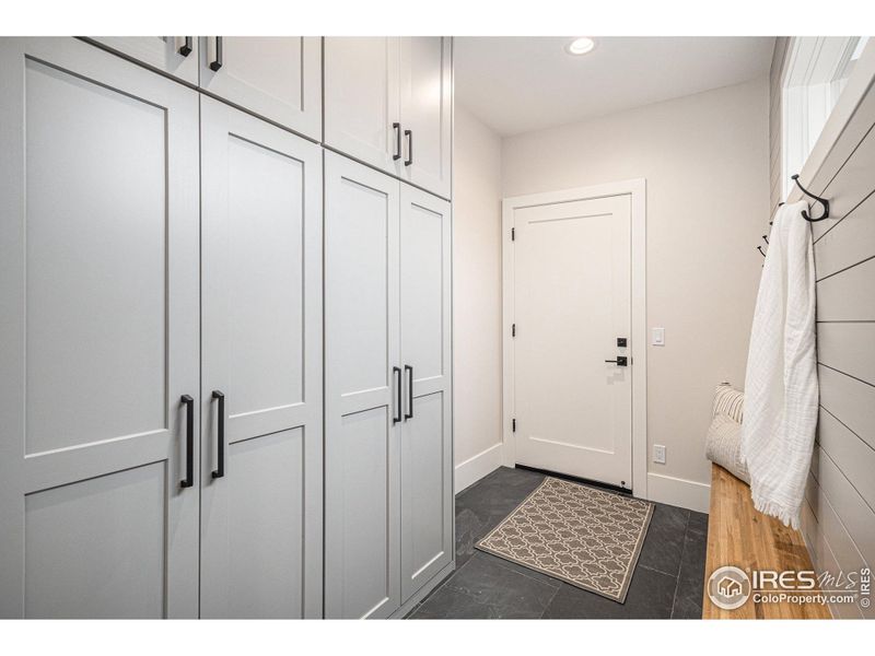 Mud room off of the garage with built in features and storage Mud room off of the garage with built in features and storage