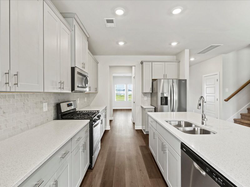 Furnished interior view inside a new home in The Farm at Wells Creek - Signature Collection, Gray Court (Image 5). Furnished interior view inside a new home in The Farm at Wells Creek - Signature Collection, Gray Court (Image 5).