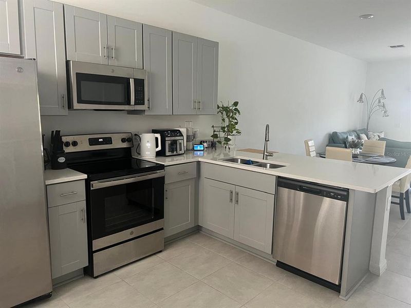 Furnished interior view inside a new home in , Kissimmee (Image 4). Furnished interior view inside a new home in , Kissimmee (Image 4).