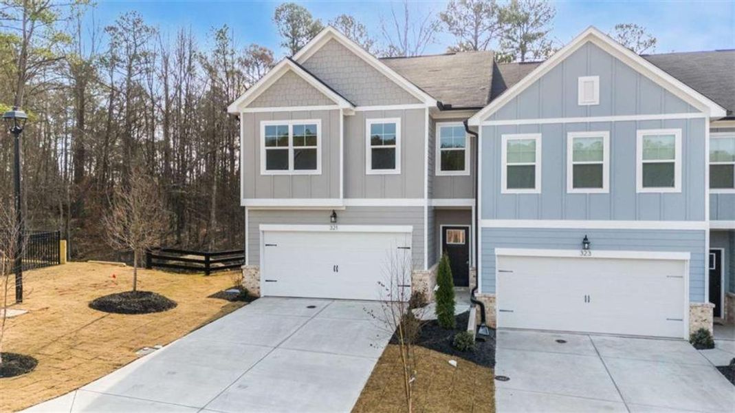 Front exterior of a new home in , Conyers, GA, highlighting curb appeal (Image 20).