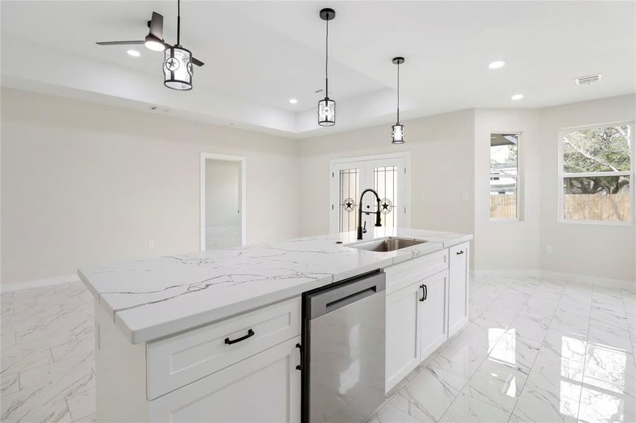 Kitchen island with dishwasher included.