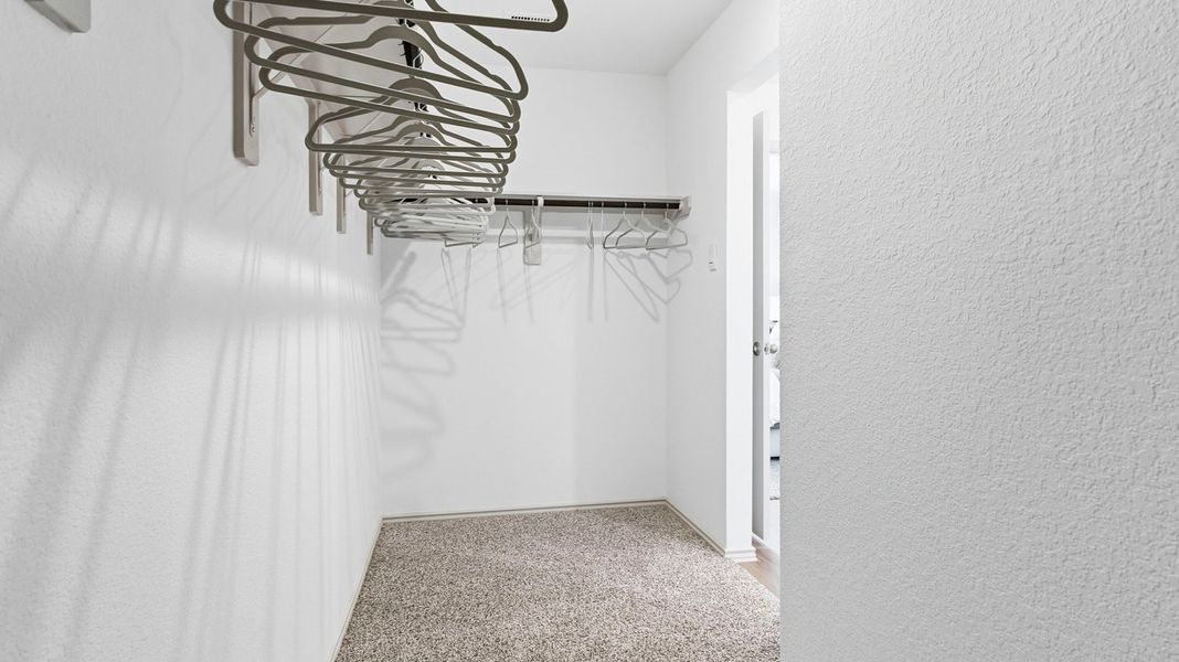 Representative unfurnished interior of a home built from the Estero by D.R. Horton in Watermark, Alvin (Image 18).