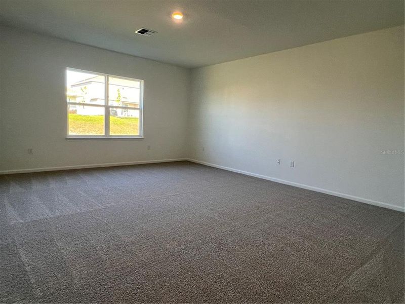 Spacious, unfurnished interior of a new home in Hills of Minneola, Minneola (Image 23).