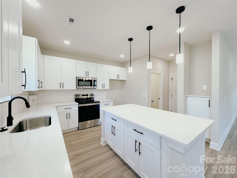 Furnished interior view inside a new home in , Huntersville (Image 7).