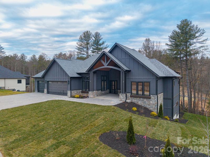 Front exterior of a new home in , Horse Shoe, NC, highlighting curb appeal (Image 24).