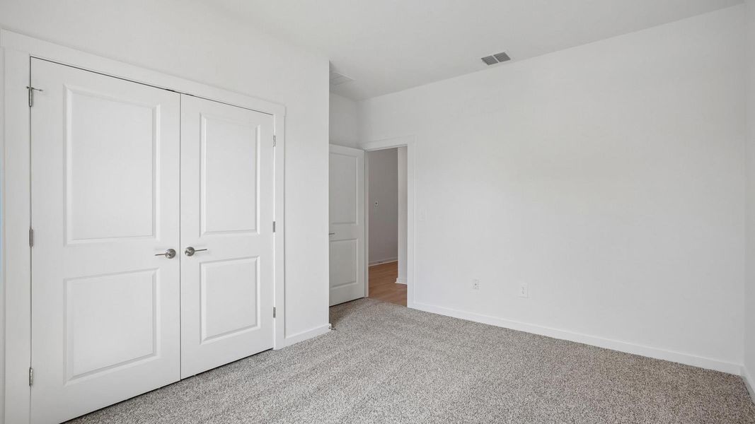 Spacious, unfurnished interior of a new home in Rosenbusch Ranch, Leander (Image 22).