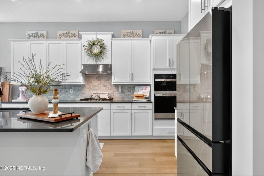 Furnished interior view inside a new home in RiverTown - WaterSong, St. Johns (Image 16).