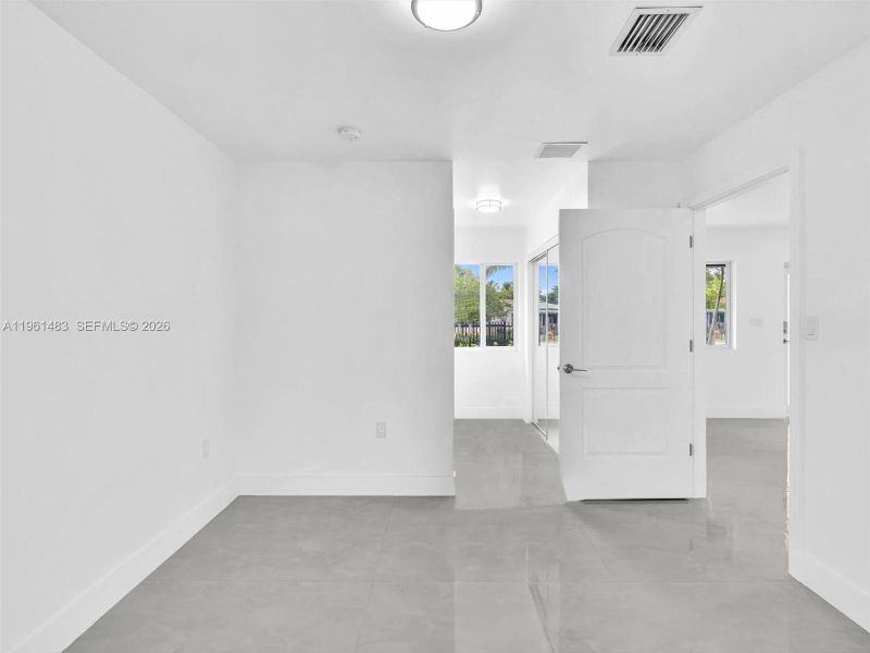 Spacious, unfurnished interior of a new home in , North Miami (Image 28).