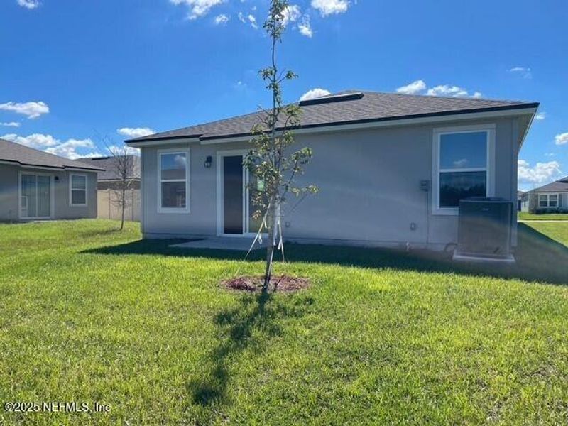Exterior details and patio area of a home in The Arbors, Jacksonville (Image 36). Exterior details and patio area of a home in The Arbors, Jacksonville (Image 36).