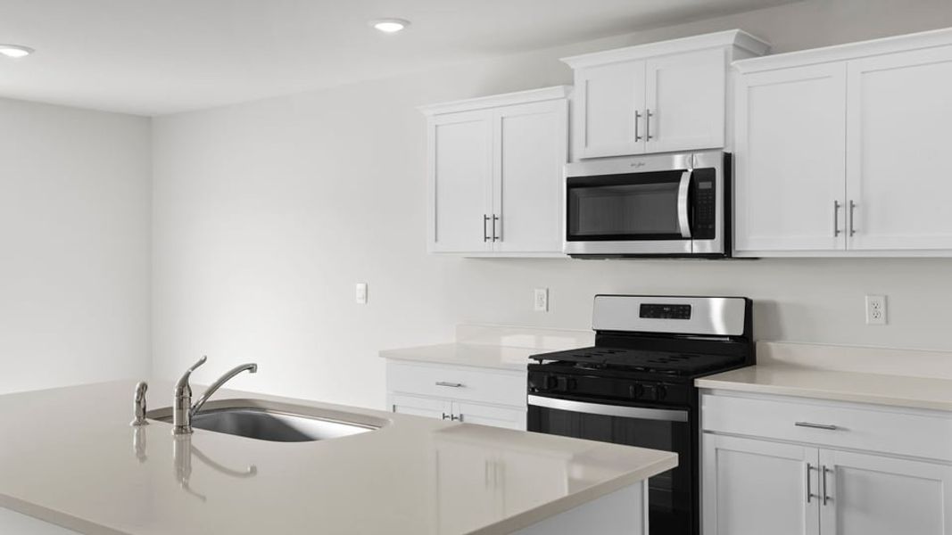 Furnished interior view inside a new home in Bentley Park, Greenwood (Image 7).
