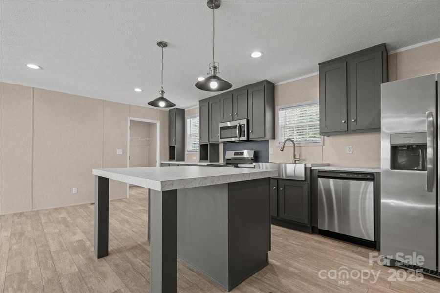 Furnished interior view inside a new home in , Ruby (Image 7). Furnished interior view inside a new home in , Ruby (Image 7).