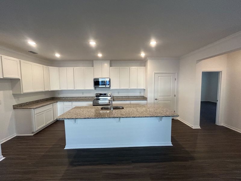 Furnished interior view inside a new home in Brookshire Green, Kingsland (Image 6).