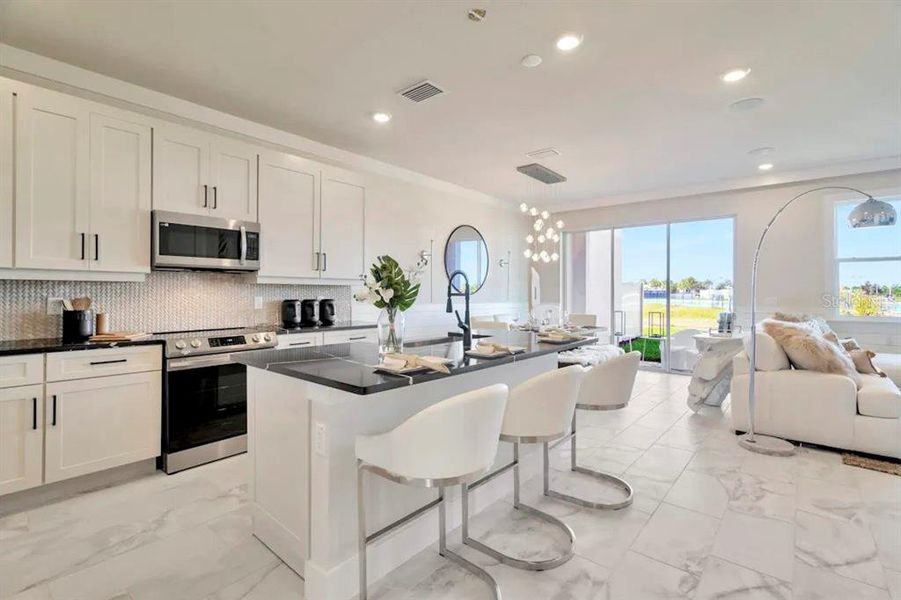 Furnished interior view inside a new home in Lagoon Residences at Epperson, Wesley Chapel (Image 6).