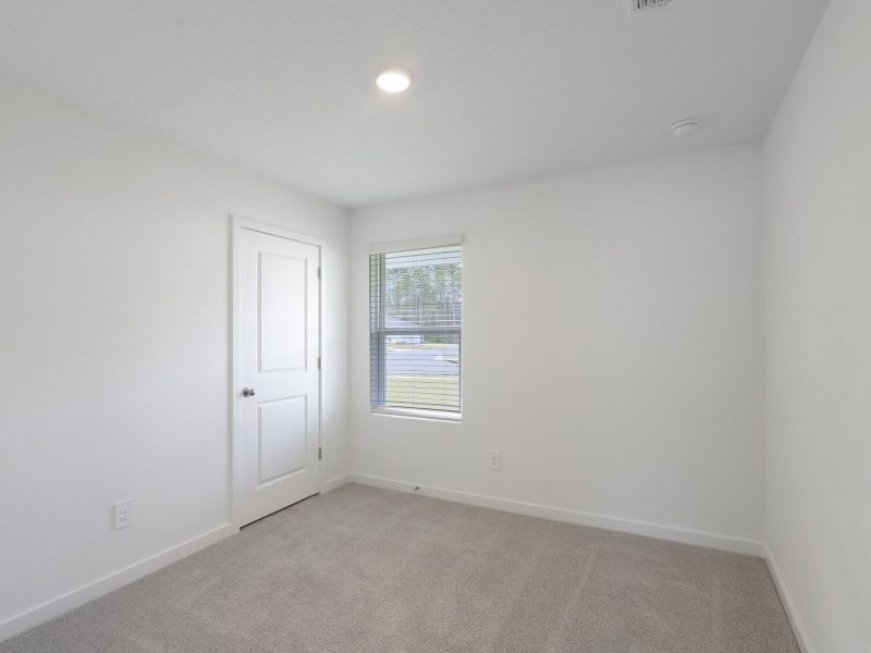 Spacious, unfurnished interior of a new home in Lakes at Bella Lago - Classic Series, Green Cove Springs (Image 11).