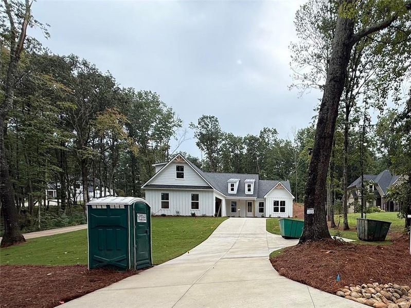 Front exterior of a new home in , Canton, GA, highlighting curb appeal (Image 2). Front exterior of a new home in , Canton, GA, highlighting curb appeal (Image 2).