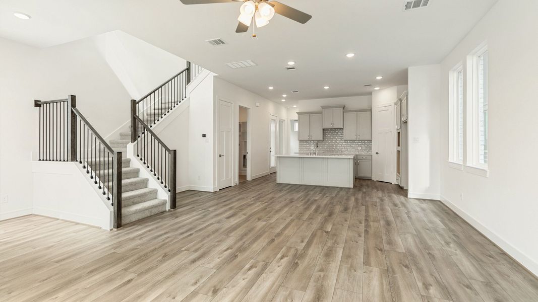 Representative furnished interior of a home built from the Valencia by Brightland Homes in Bridgeland Central, Cypress (Image 5).
